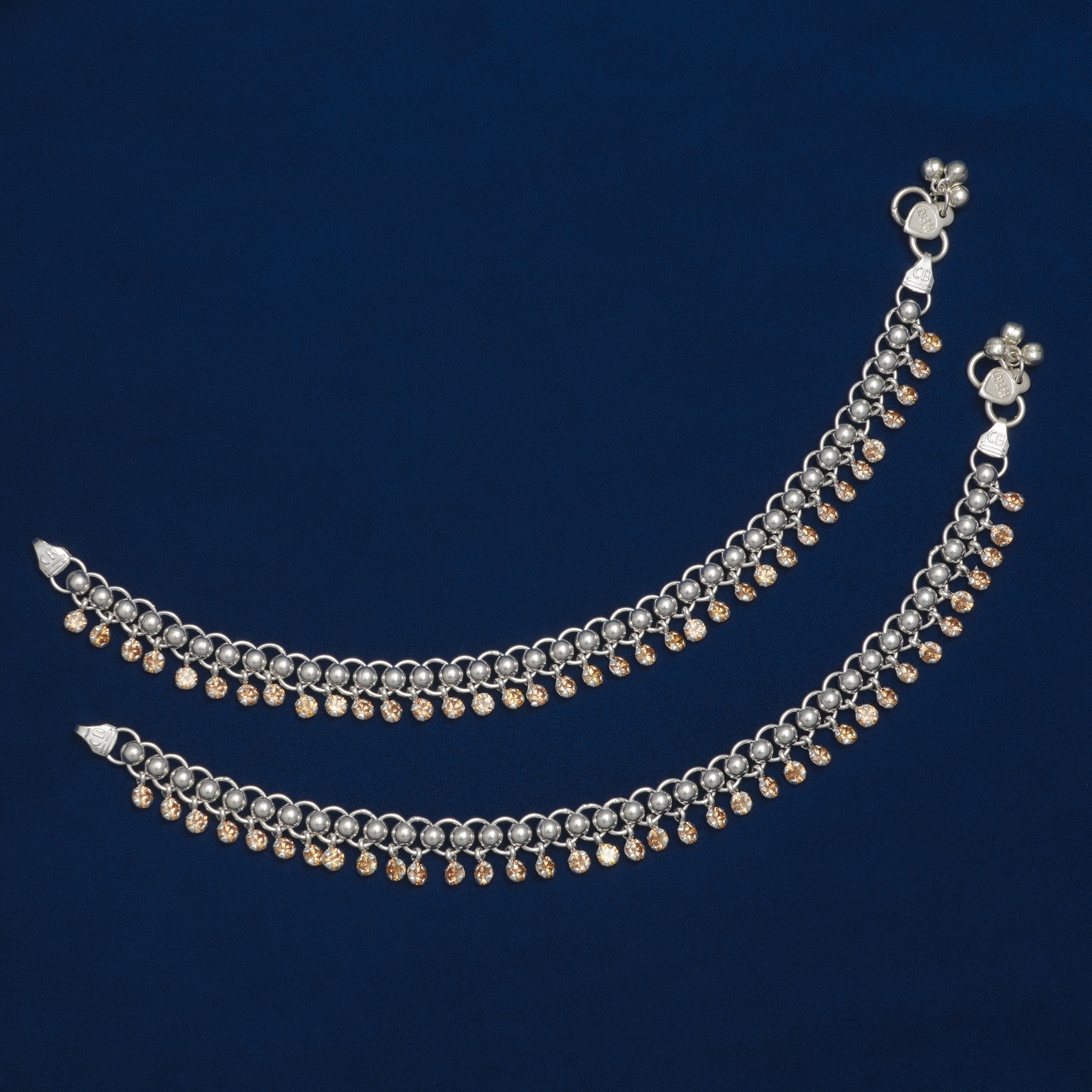 TRADITIONAL SILVER PAYAL WITH GOLDEN STONE HANGING DESIGN